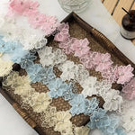 ruban dentelle décoratif fleurs relief élégant rose blanc bleu clair violet gris noir