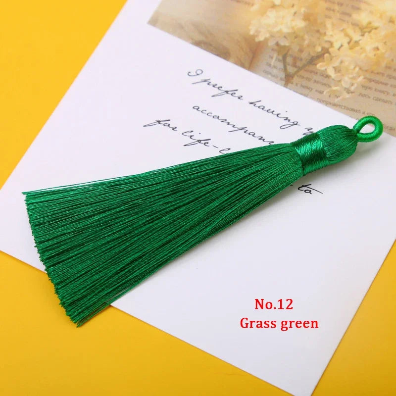 lot dix pompons soyeux anneau métallique décoration rideau couture bijoux artisanat
