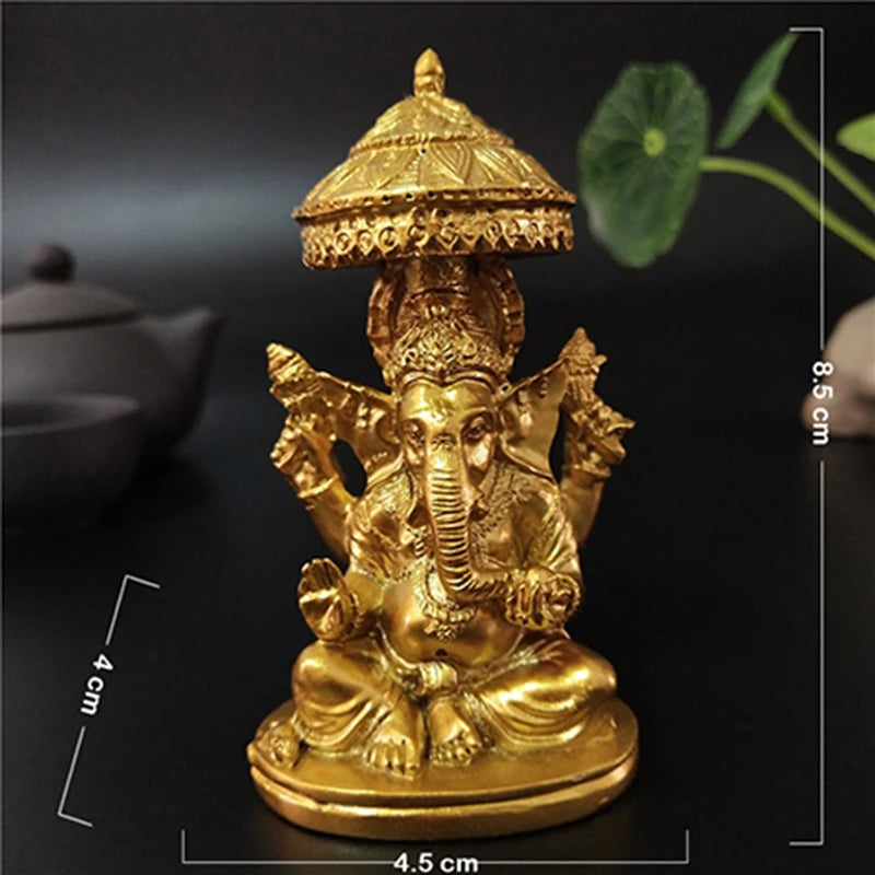 statue ganesha dorée résine ornements complexes décoration intérieure artisanale traditionnelle bouddhiste éléphant multiple bras