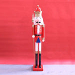 figurine soldat noel rouge blanche bleue dorée verte uniforme militaire couronne dorée moustache ruban
