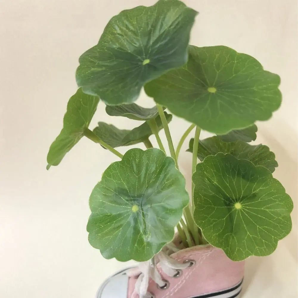 plantes artificielles feuilles vertes décoratives intérieur extérieur exposées anniversaire originalité verte