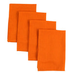 Nappes en lin de couleur orange vif, parfaites pour une décoration de table originale.