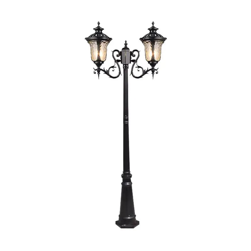 lampadaire extérieur or noir verre translucide vintage élégant détails sculptés deux lampes abat jours