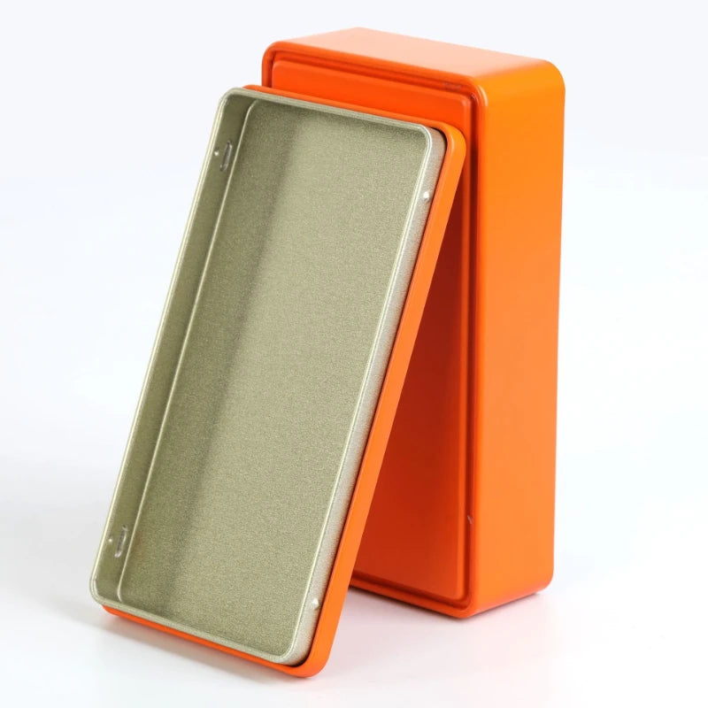 boîte rangement métal réutilisable contenant thé bijoux organisation moderne orange intérieur beige