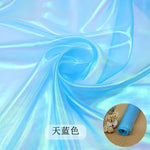 tissu iridescent multicolore rayures ondulées effet holographique semi transparent moderne élégant polyester respirant mètre