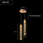 lampe suspendue moderne or noir cristal bulle brillant transparent chambre salon étude
