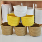 paniers rangement tissés motifs géométriques blanc rose violet beige jaune modernes réutilisables respectueux environnement