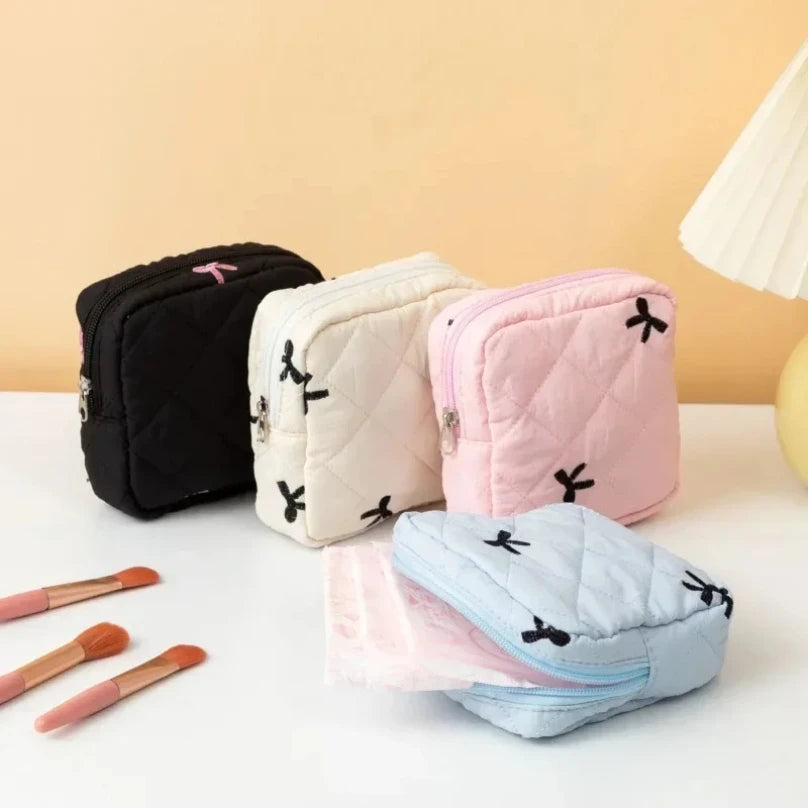Sac cosmétiques polyestère noir blanc rose bleu cuir mat fermeture glissière poudre compacte brosse