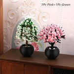 décoration intérieure plante artificielle fleurs feuilles pot terre cuite galets blancs moderne minimaliste