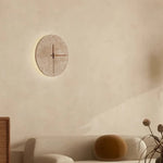 horloge murale pierre texturée minimaliste éclairage salle manger contemporaine fixée mur LED tricolore