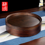 boîte thé marron foncé texture bois naturelle classique rouleau thé couteau thé