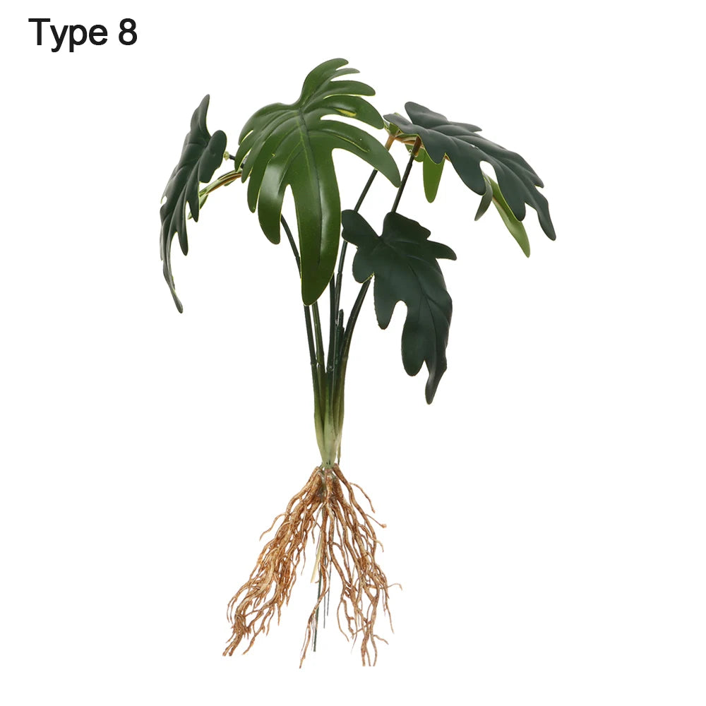 ornement décoration intérieure plante artificielle feuilles larges racines visibles vert foncé points blancs
