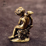 statue ange enfant dorée ailes base végétale renaissance ornement décoration intérieur classique erotique miniature