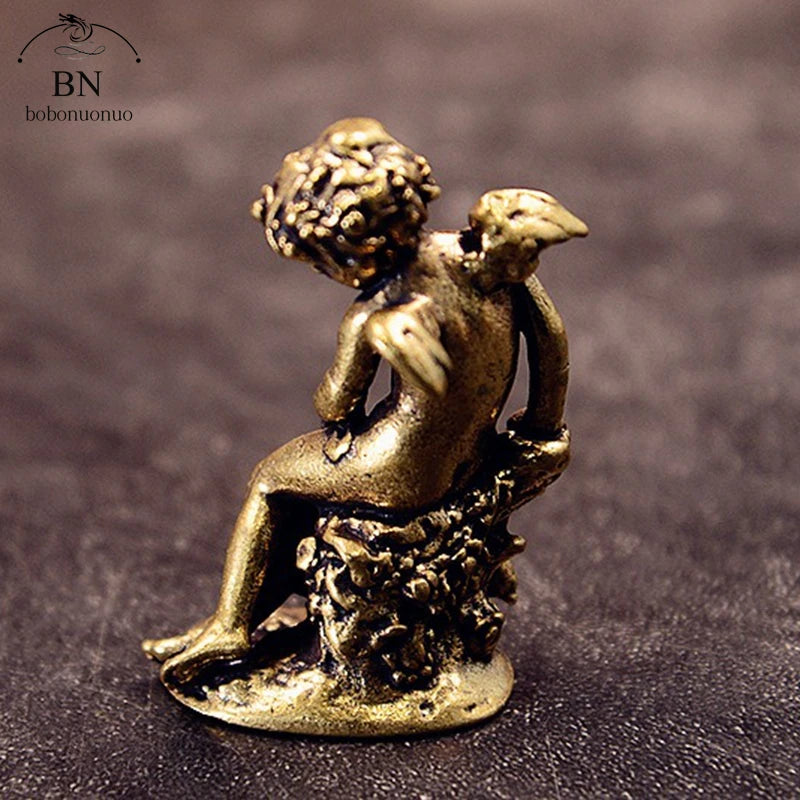 statue ange enfant dorée ailes base végétale renaissance ornement décoration intérieur classique erotique miniature