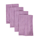 Serviettes de table en lin mauve de différentes tailles, parfaites pour décorer une table élégante.