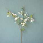 décoration intérieure fleurs artificielles soie rose blanc jaune vert branches feuilles vases transparents printemps