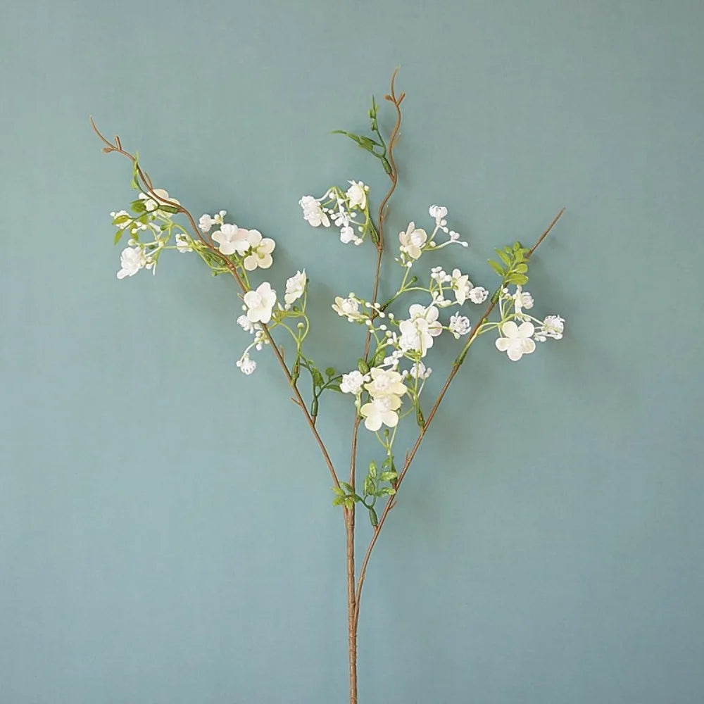 décoration intérieure fleurs artificielles soie rose blanc jaune vert branches feuilles vases transparents printemps