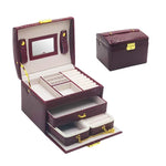 boîte bijoux rouge croco miroir compartiments poignée boutons dorés classique porte bijoux sécurité