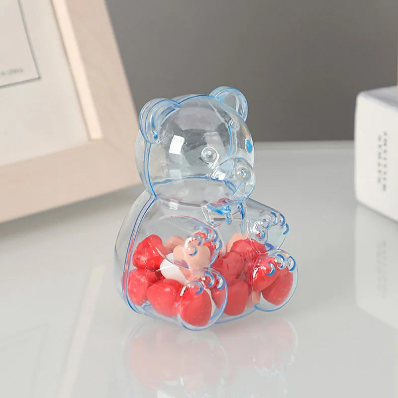 boîtes bonbons ours transparentes rose clair contemporaines mignonnes coeurs rouges blancs oranges mariage snacks