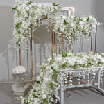 guirlande florale artificielle fleurs clochettes roses feuilles vertes décoration élégante intérieure classique événement anniversaire