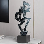 sculpture décorative abstraite moderne bleu clair noir transparent lumière reflétée living room ambiance chambre
