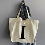 sac main femme toile beige clair lettre noire poignées détachables