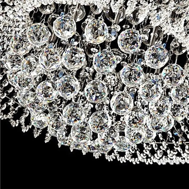 boule cristal transparente facettes géométriques moderne élégante anneau métallique suspension décoration intérieure très transparente