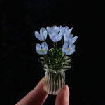 bouquet artificiel violet jaune vert blanc bleu orange feuilles vertes miniature vase transparent six