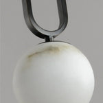 lampe suspendue marbre noir blanche moderne minimaliste globes translucides support métallique