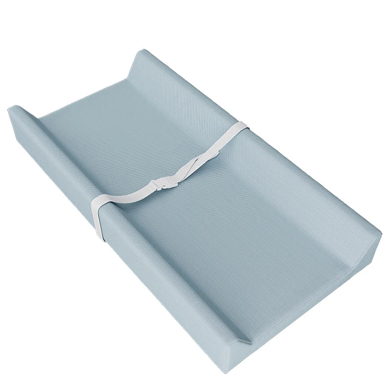 tapis changement bébé beige bleu clair imprimé dinosaures poissons ceinture sécurité moderne pratique