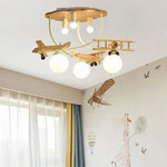 lampe bois naturel avions sphères translucides vintage moderne chambre enfants