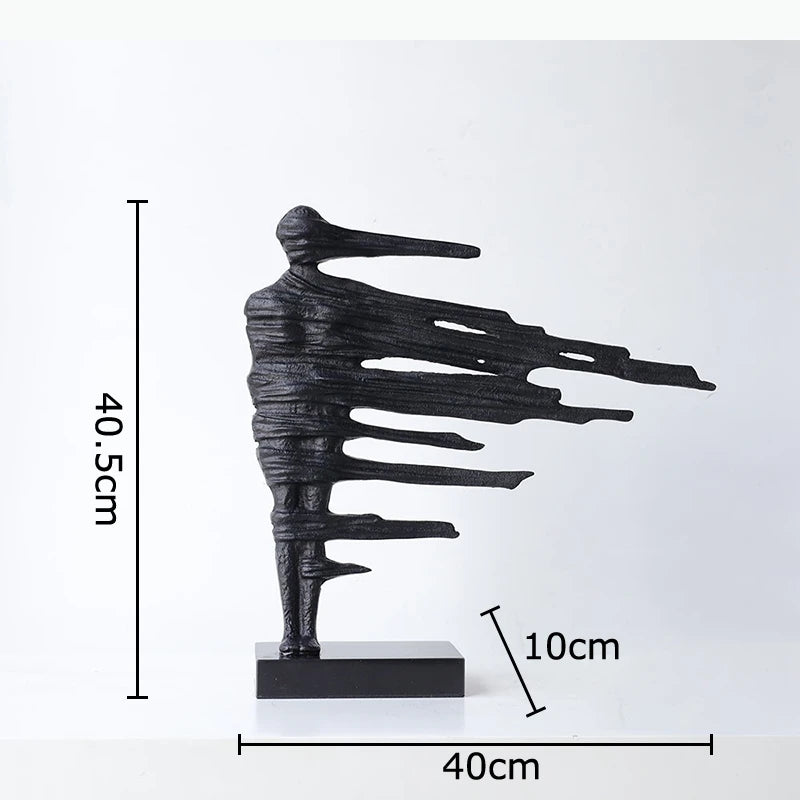 sculpture moderne abstraite figures noires texture rugueuse ligne horizontale décoration intérieure chambre