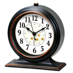horloge table classique quartz aiguille brun foncé cadre bois chiffres romains transparent verre vintage