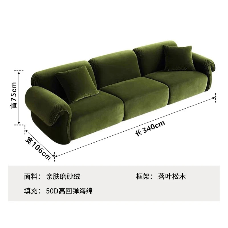 canapé vert olive moderne tissu uni bois coussins décoratifs sectionnel français minimaliste