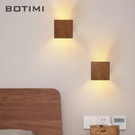 lampe murale moderne bois naturel marron clair éclairage quotidien chambre entrée étude interrupteur bouton