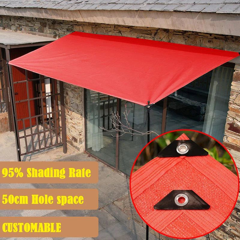 Voile d'ombrage rectangulaire blanche installée sur une terrasse