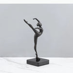 statuette ballerine moderne noire texturée socle deux livres fashion