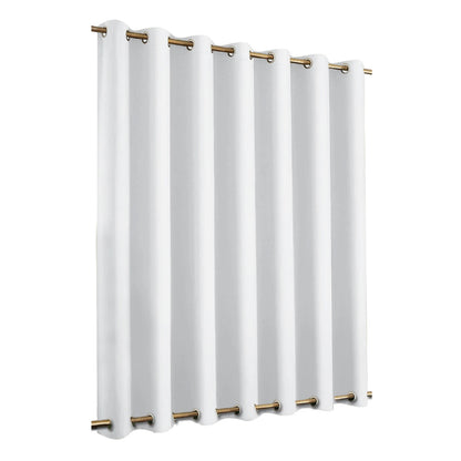 Rideau opaque blanc avec œillets, élégant et moderne, idéal pour un salon ou une chambre, offrant une belle luminosité et une ambiance paisible tout en préservant l'intimité.