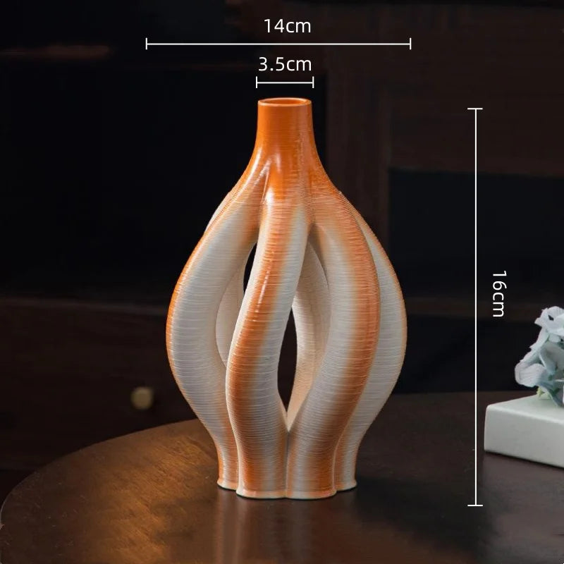 vase moderne blanc marron rouge orange rayures horizontales opacité maison fleurs table