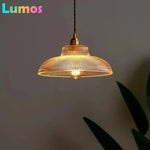 lampe suspendue vintage rétro dorée transparente rayures horizontales câble torsadé ampoule inclusion