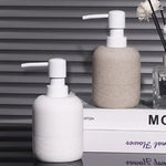 distributeur savon liquide céramique blanc beige moderne minimaliste texture granulée Pompe.pression