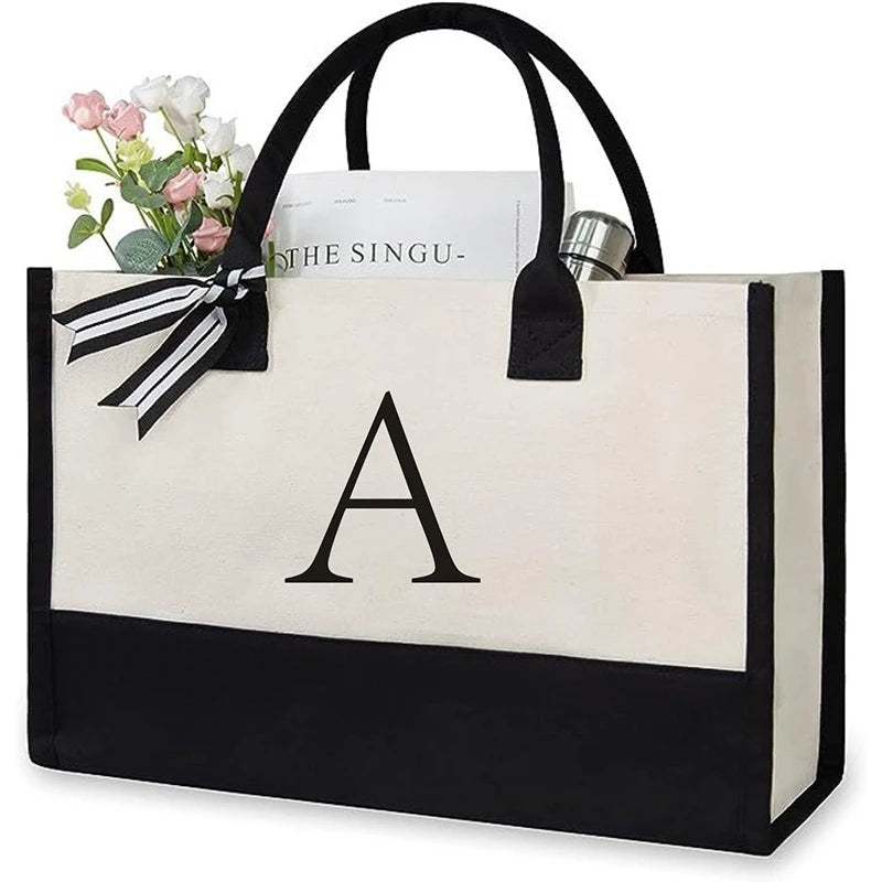 sac main toile lettre imprimée blanc noir rubans classique poignées intérieur noir zippé capacitaire