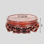 support bois sculpté motifs floraux artisanal decor maison marron foncé tranchant deco vase pot