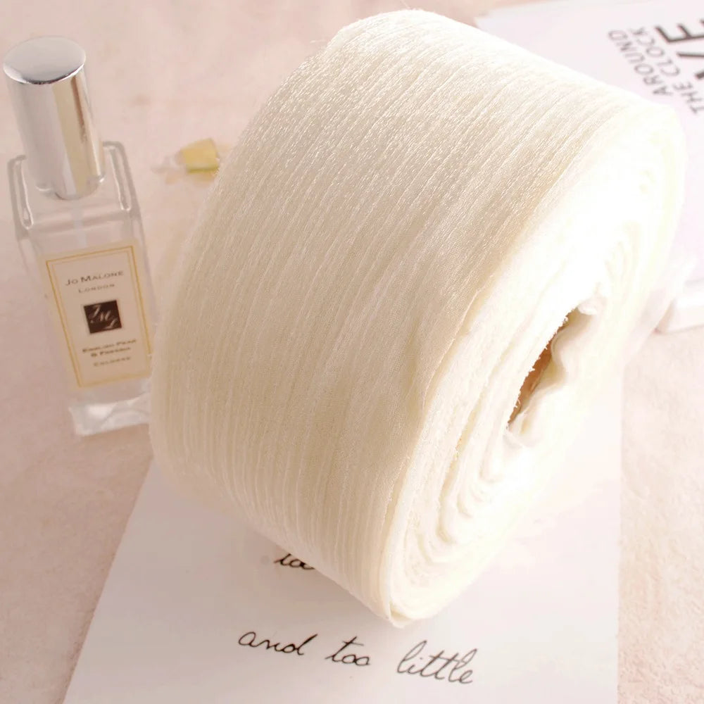 ruban voile polyester double face blanc rose pâle bleu clair mariage artisanal élégant plissé