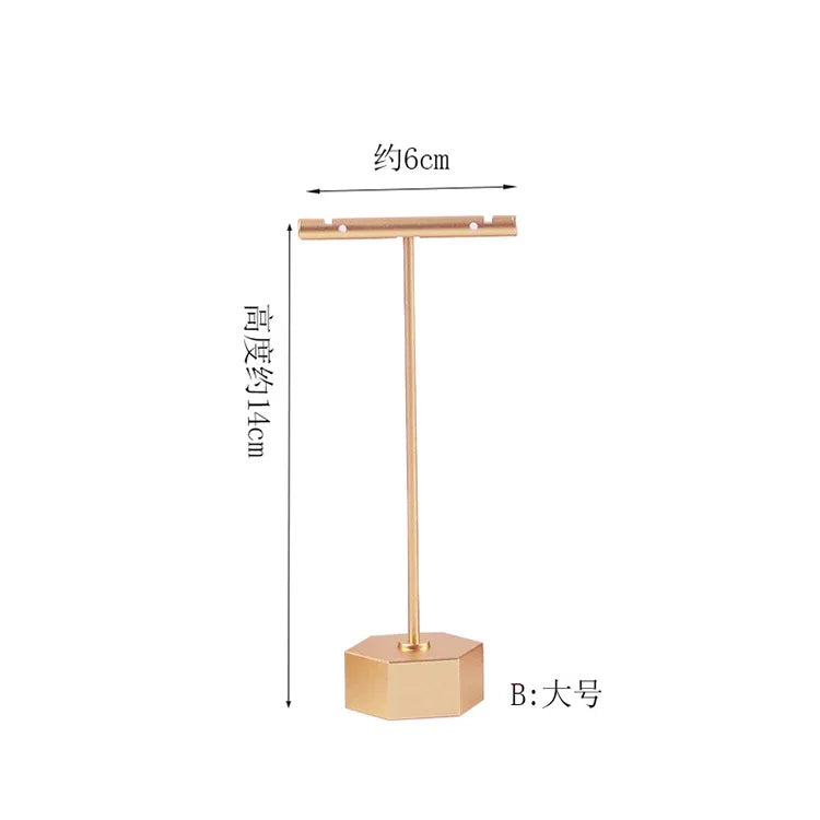 présentoir bijoux métal or mat texture brossée moderne élégant base conique supports différents tailles