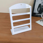 porte boucles d'oreilles moderne velours noir blanc grille perforations pieds boucles d'oreilles.storage organizer