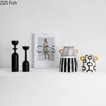 vase céramique rayures noires blanches moderne décoration intérieure arrangement fleurs artificielles minimaliste