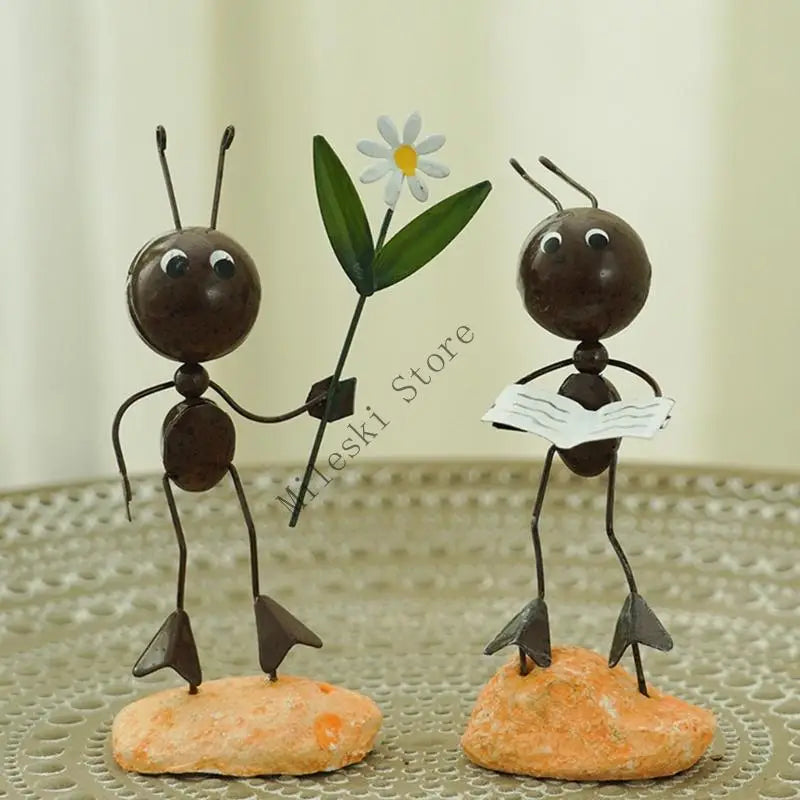 figurine métallique jardin feuilles fleurs décor extérieur moderne artisanal noir bleu vert orange blanc