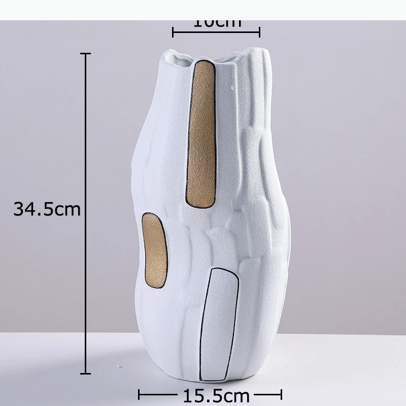 vase moderne texturé découpes géométriques lignes noires blanc doré marron