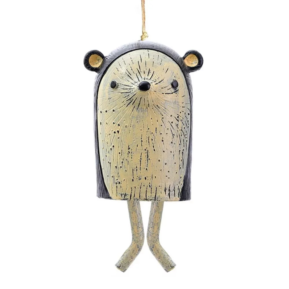 cloches décoratives animaux ours renard hibou motifs poils plumes artisanal extérieur